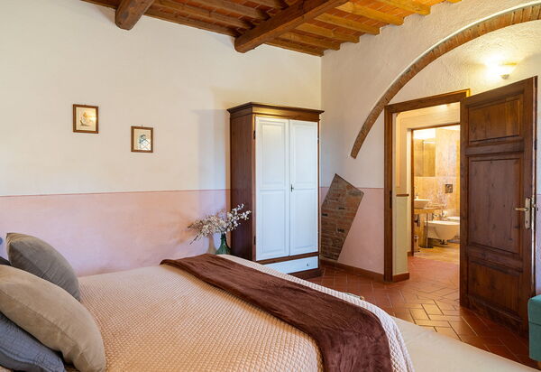 Montelopio: chambre à coucher