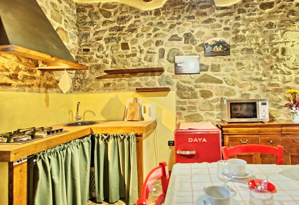 Podere Orietta: Гостиная, Кухня, Столовая