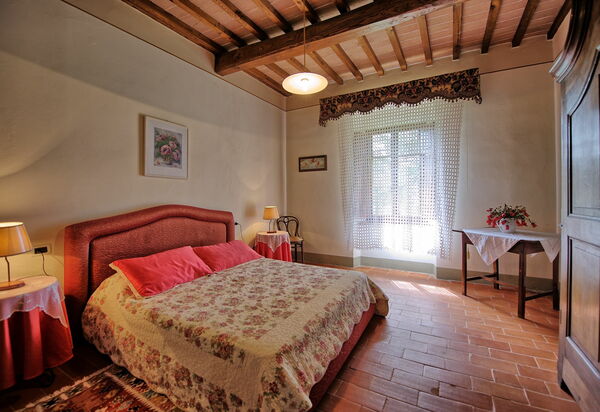 Villa Capolona: Schlafzimmer