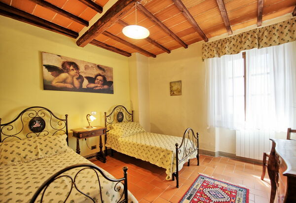 Villa Capolona: Schlafzimmer