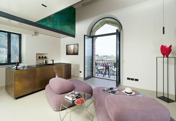 Torre Isola Bella: Гостиная, Кухня, Столовая