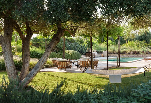 Villa Degli Aranci: basseng, Hage