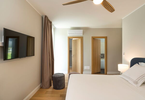 Villa Colleverde: chambre à coucher