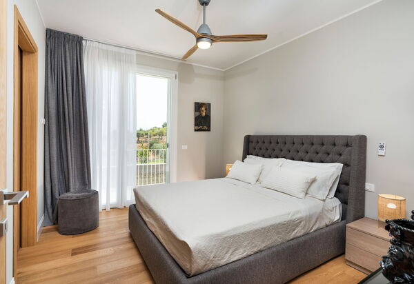 Villa Colleverde: chambre à coucher