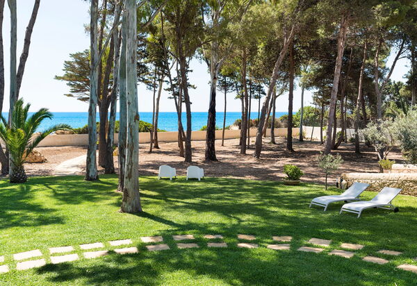 Marinella Punta Milocca: Buitenshuis, Tuin