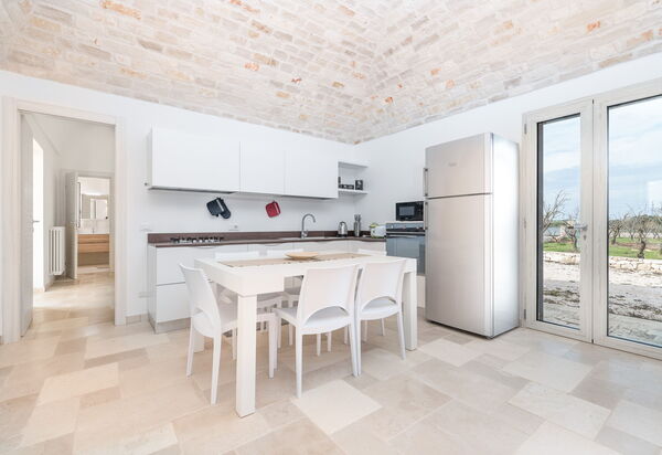 Villa Trullina: Гостиная, Кухня, Столовая