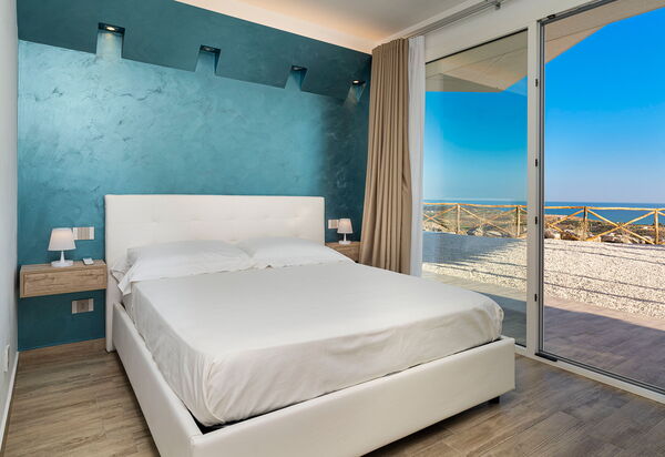 Villa Domizia: chambre à coucher