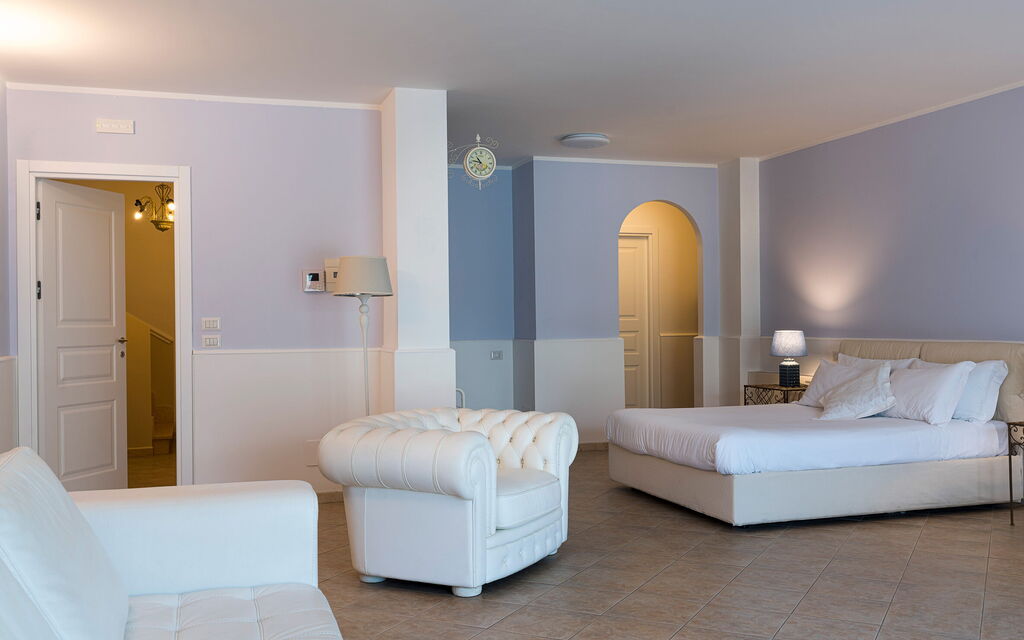 Villa Giutitta: chambre à coucher