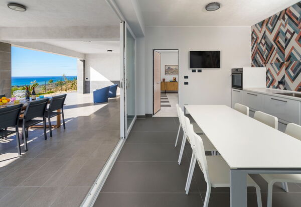 Villa Giglio Di Mare: Esszimmer, Küche