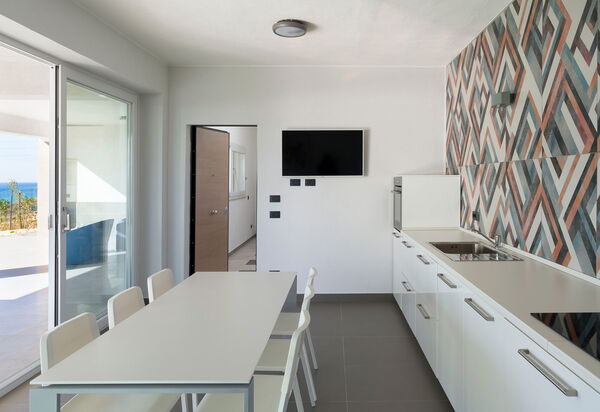 Villa Giglio Di Mare: Esszimmer, Küche