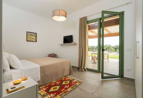 Villa Cavalè: Спальня