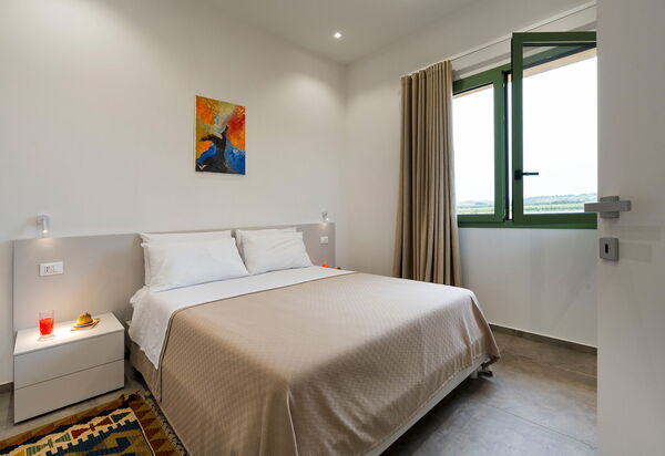 Villa Cavalè: Спальня