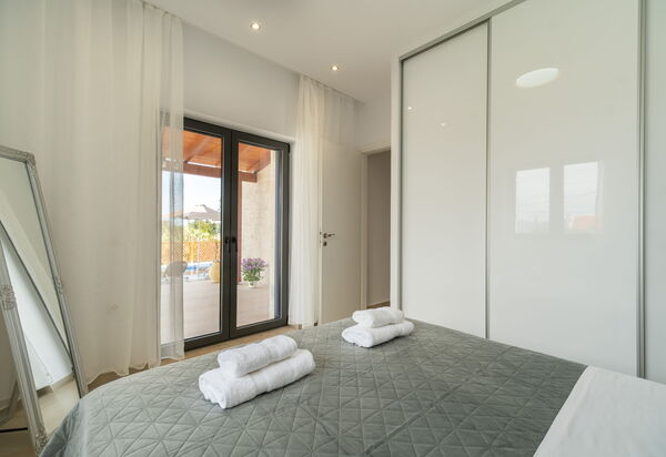 Villa Blini: chambre à coucher