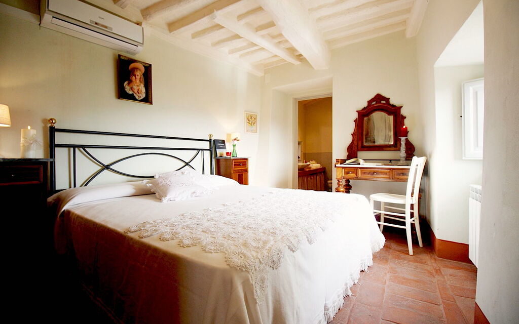 Villa Le Corchie: chambre à coucher
