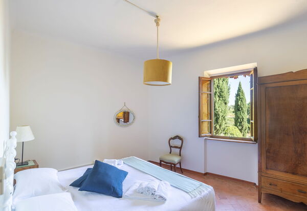 Podere Lupinati: chambre à coucher
