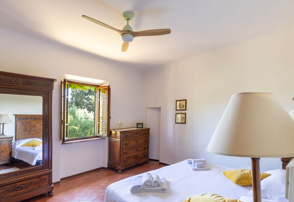 Podere Lupinati: chambre à coucher
