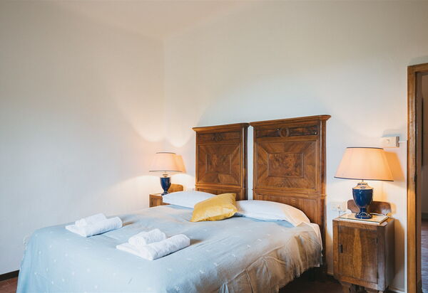 Podere Lupinati: chambre à coucher