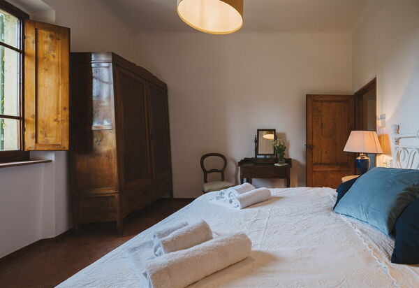 Podere Lupinati: chambre à coucher