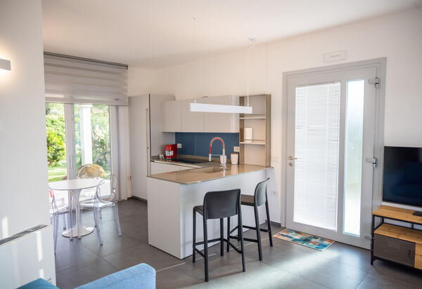 Villa Fior D'acqua: Гостиная, Кухня, Столовая